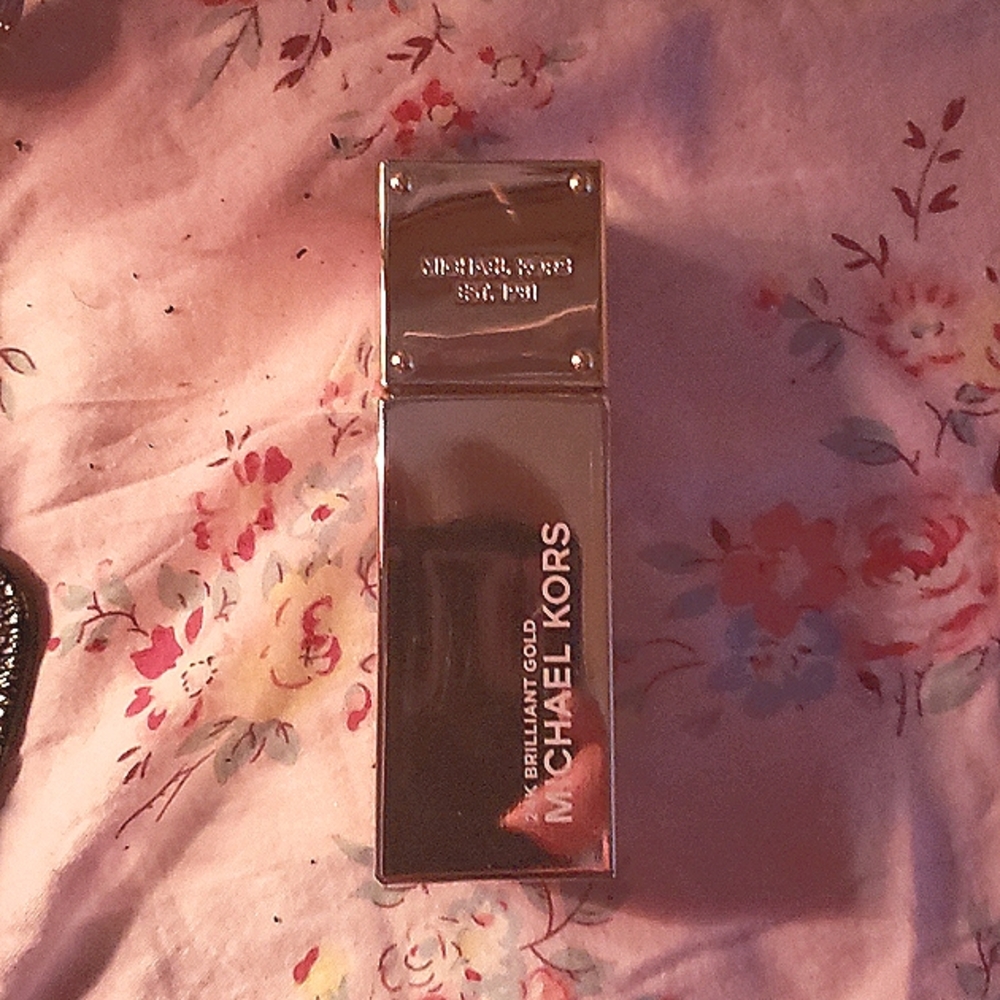 24k brilliant gold 1.7 fl oz